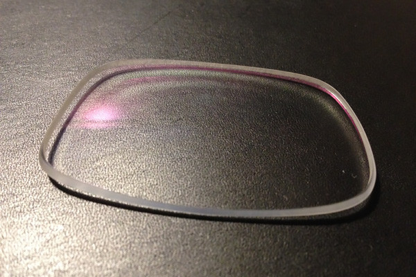 Lens after polishing with compound cloth