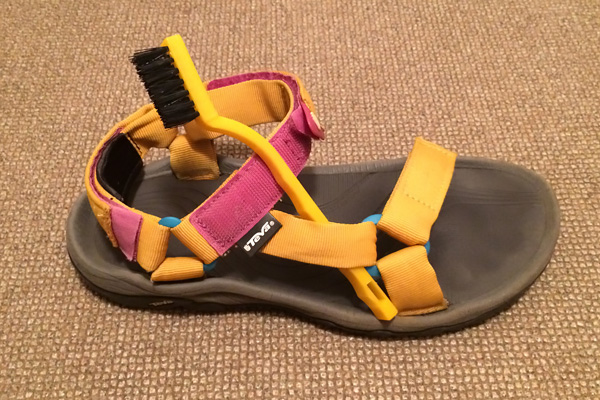 Brushing Velcro with a plastic brush