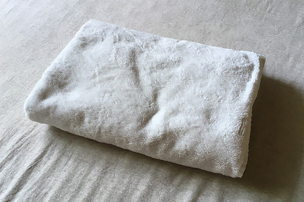 Folded towel pillow